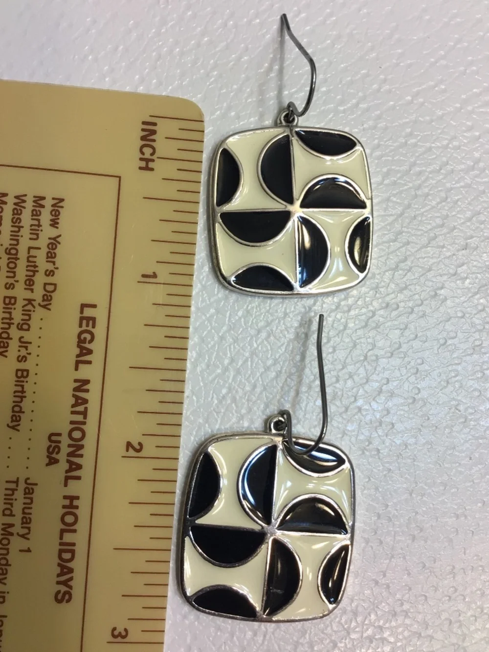 Stylish 1980s Geometric Enamel Hook Earrings with Black and Cream-colored Design